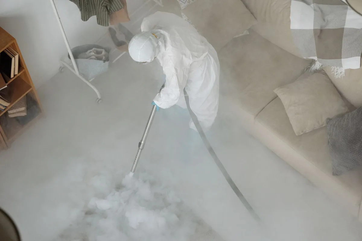 Biohazard cleanup technician in protective equipment, Bonduel, WI